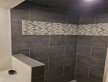 Pebble mosaic tile accent strip, Edina, MN
