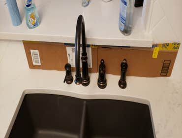 Newly installed oil rubbed bronze kitchen faucet