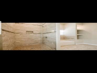 Photos by The American Dream Custom Home Builder #1 New custom built home. 3 bdrm 2 bathrm. Beautiful hard wood floors, custom cabinets and tile shower
