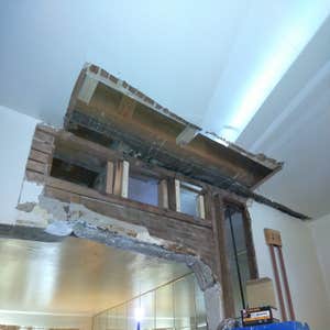 Michener st After a flood in the bathroom, the living room ceiling caved and the joists were damaged and the sculpted archway was completely...