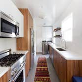 Culver City 2016 Extensive interior and exterior remodel. We used Carrara marble and hexagon tile throughout the bathrooms. In the kitchen we installed