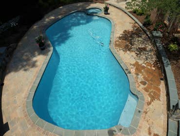 Photos from Crystal Blue Aquatics Llc New Construction of pool with full automation, LED lighting, high end travertine patio decking, beautiful water f
