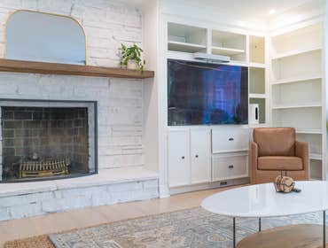 Photos by Albrecht, LLC #1 Through strategic space planning, thoughtful material selections, and custom craftsmanship, this first-floor renovation tran