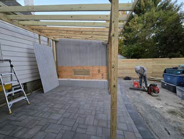 Photos by Rojas Landscaping & Handyman Services LLC #1 Preasure Threated Wood Horizontal Fence Installation
Exterior Fire Place
Paavers Patio/walkway