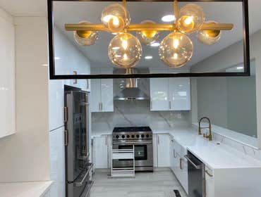 Photos by Pan Shi Construction Inc #1 Converted an existing garage into a fully functional Accessory Dwelling Unit (ADU), The project included framing 