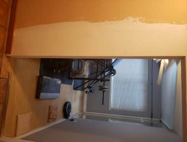 Photos by M.Y Contractors Inc #6 Modify opening and change to barn door.
