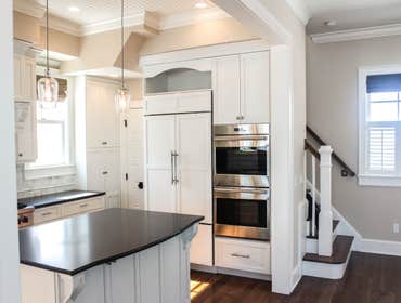 Baine Contracting Inc Project Multiple jobsites - showing kitchens, interior and exterior trim work, new homes, bathrooms, tile work, wood and iron ra