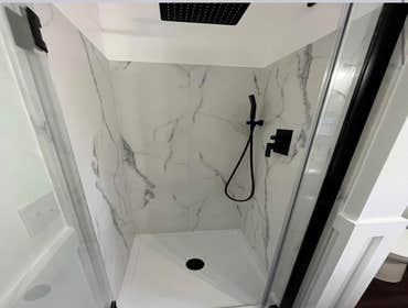 Photos by Pristine Construction #33 Converted a half bath into full bathroom