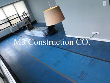 Photos by M3 Construction Co #1 1200 sq ft luxury vinyl plank on lake front high-rise