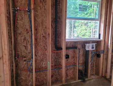Photos by Top of the West Plumbing #2 5 bathroom, 2 kitchen, 2 laundry rooms. Hydronic floor heating throughout.