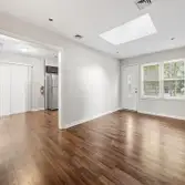 Photos by Swj Builders LLC #1 This full home renovation included a complete kitchen and bathroom remodel, new flooring throughout the house, interior p