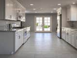 Baggett Kitchen Remodel (Before and After) This kitchen was outdated and had an awkward layout. The kitchen is now has an open concept and has better w