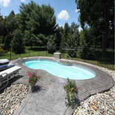 stamped concrete and fiberglass pool
