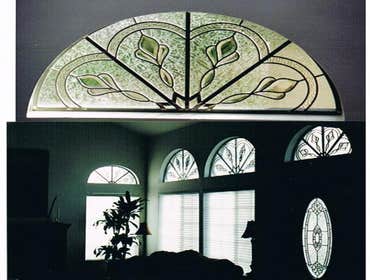 Classic Leaded Glass Living Room Here is a classic leaded glass living room with the half round high windows and the front door. Clear glass types wit