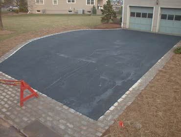 Asphalt driveway with Belgian