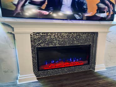 CUSTOM FIREPLACE WITH MANTLE