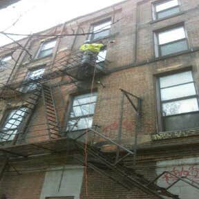 Arch street fire escape demo Complete demolition of old fire escape.