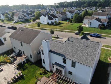 Photos by 614 Exteriors, LLC #25 Completed roof replacement with Atlas Pinnacle Coastal Granite shingles.