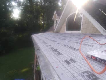 Photos by A-earlybirds #1 Remove existing roof, replacing with newly installed asphalt shingles.. Tieng the newly installed roof nack into the existing
