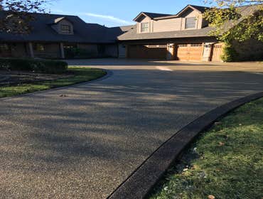 exposed aggregate Driveway Photo by Potoroka Concrete Macomb MI