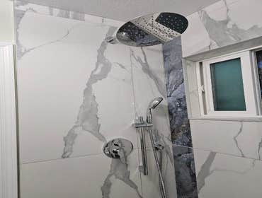 Fine Design Remodeling resume painting, frame, tile, cabinet install, shower, more.