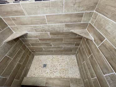 Photos by Triple A LLC #1 Complete bathroom remodel, removal of flooring and old shower and tub.