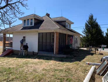 Photos by Professional Window Installers #1 Large bow and 8 windows. Fiberglass Andersen’s for this project