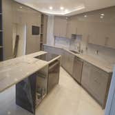 Photos by Bayside Home Improvement Inc #3 In this project we completly remodeled the kitchen with new cabinets, countertops, backsplash, floors, lights