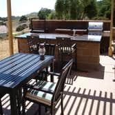 Outdoor Kitchen & Furniture Home is where the heart is and the kitchen is usually the pulse of it. Everyone seems to gather here to create a feast, sha