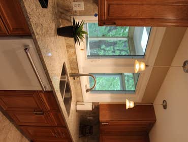 Home Addition, Alexandria, Virginia Our clients wanted a bigger kitchen to entertain family and friends. They also wanted to spend time outdoors, there