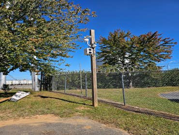 Photos by Phoenix Custom Systems, Inc #1 installed remote cameras on the edge of the parking lot for customers' security.