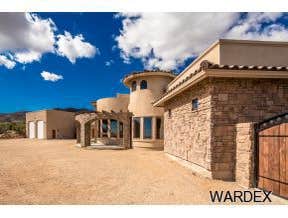 Photos by Sequoia Homes LLC #1 This Tuscan/Mediterranean style home is truly one of Mohave County's finest luxury homes. Over 1 acre of property in the