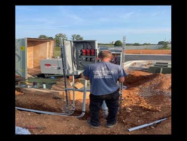Photos by Elite Electrical Installations LLC #1 Built 200 amp service for septic pump and hooked up the controls and the alarm system.