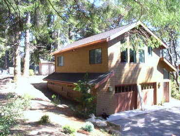 Shanower residence New live / work building to match existing.
2 car garage with drive through, workout room, bathroom.