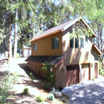 Shanower residence New live / work building to match existing.
2 car garage with drive through, workout room, bathroom.