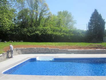 Photos by Dunn Landscape Construction #1 After initial pool installation provide all hardscape including retaining walls, pool deck, walkways and plant