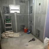 Photos by Proper Contracting Ny Inc #1 Remove old wood door and replace new metal door.
