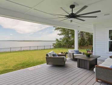 Bells River Residence Nestled in the serene Waterman’s Bluff in Yulee, FL, this exquisite home offers 3,046 sq ft of living space, expanding to a total