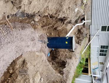 Utility installation Installing a new grinder system in Covington Twp