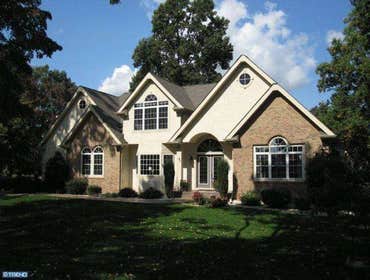 Custom Homes Unique 3,200 sf custom home. Complex and detailed roof lines creates an amazing open feel
