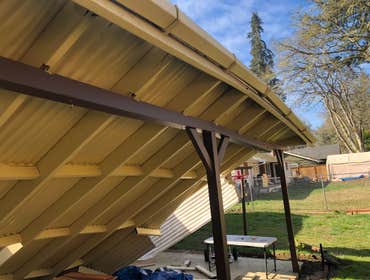 Photos by Dudley Const & Remodel LLC #1 Snow collapsed old awning on the back porch. Built brand new awning with clear, corrugated, plastic and new gut