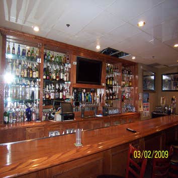 Fineline Construction Group Project Interior remodeling projects, commercial bar, flooring, basement remodel, fencing, hardscaping, and electrical.