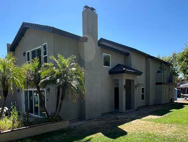 Stucco Complete, awaiting Stone Veneer for chimney