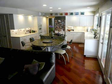 1994: Timeless White Green Cherry Kitchen This clients main objective was to increase the functionality of the kitchen area as a whole and make it the 