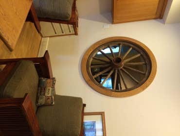 Wagon wheel fitted into wall
