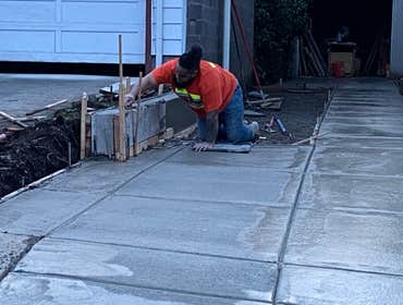 Photos by NW Regal Construction LLC #1 Driveway, retaining wall, and city sidwalk