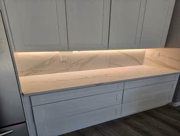 Fine Design Remodeling resume painting, frame, tile, cabinet install, shower, more.