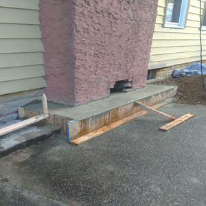 Photos by T & T Sweeps & Home Improvements,LLC DBA Absolute Chimney Service #2 Remove old foundation and pour new foundation for a chimney