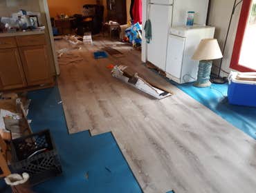Photos by JC Contracting #1 NEW LAMINATE FLOOR