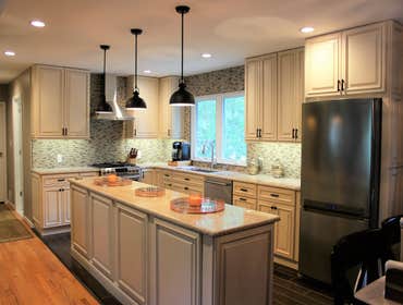 Wellington Ivory Kitchen Wellington Ivory Kitchen - Knocked down walls to open up the space and enlarge the bathroom which is the "Calcatta Marble" in 